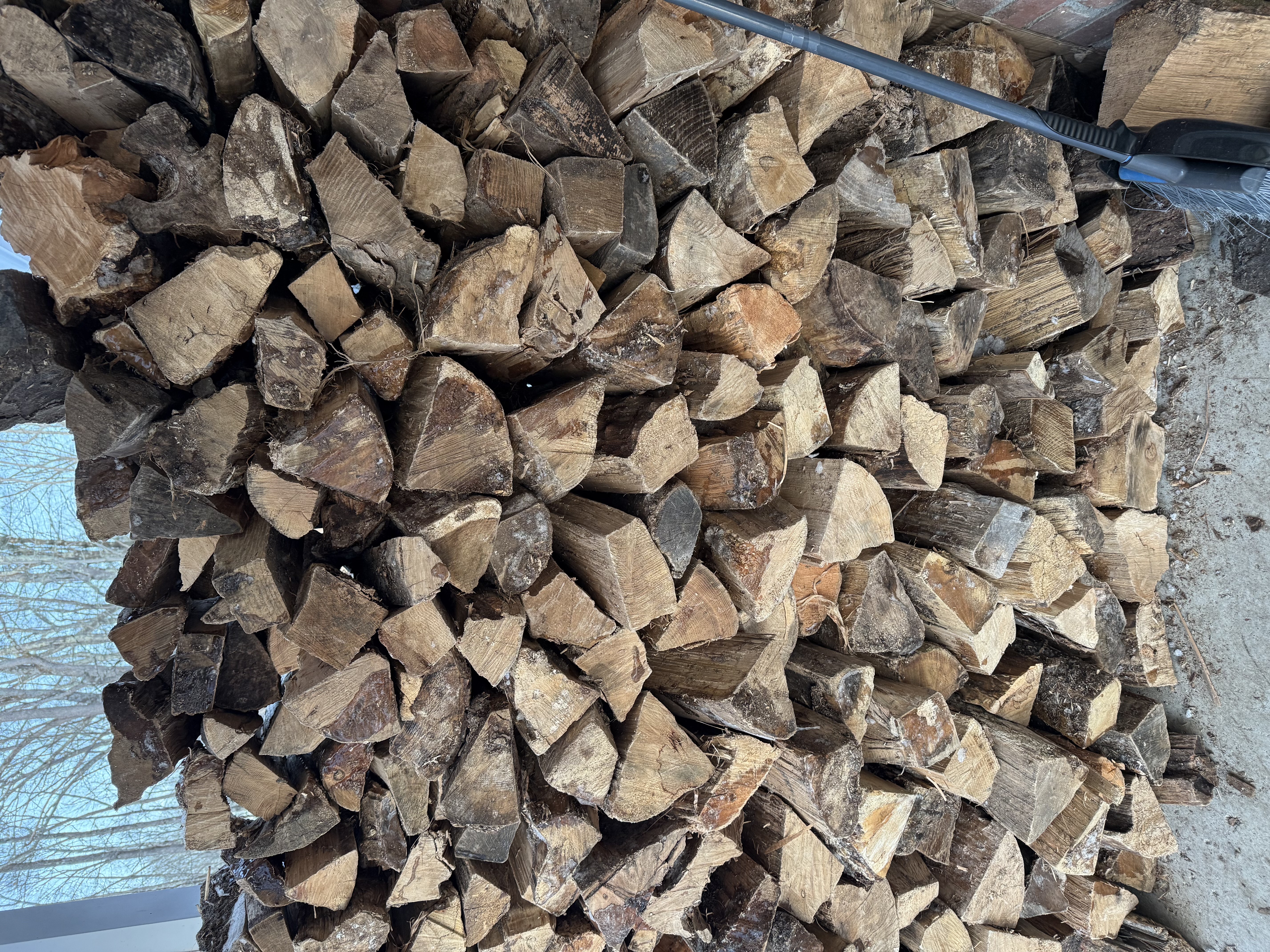 Large cord of stacked firewood